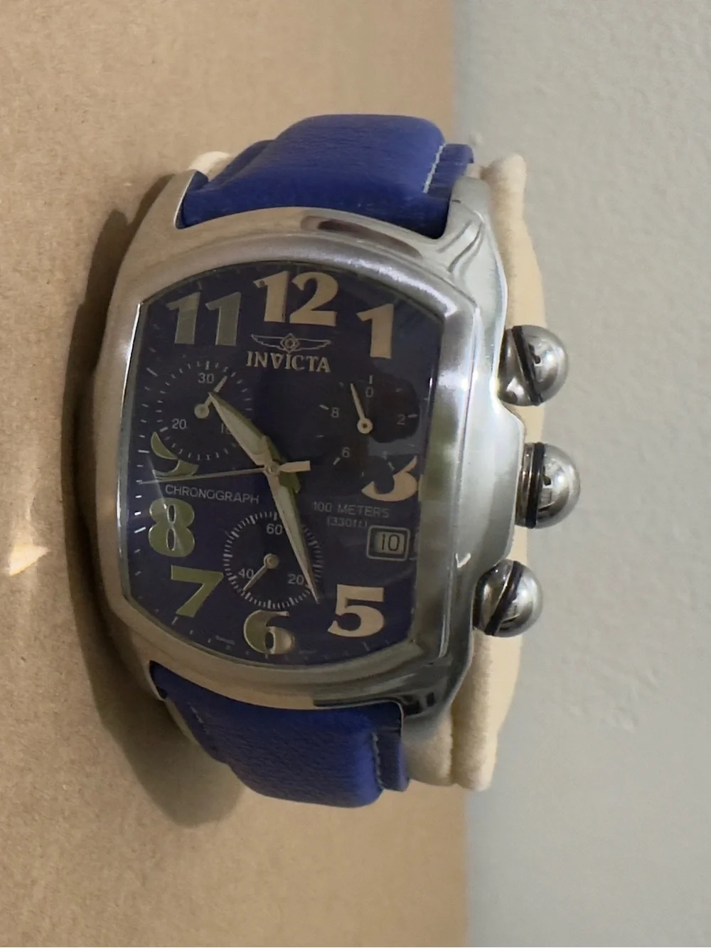 LIKE NEW. Invicta Blue Dial Chronograph Watch with Blue Leather Strap.